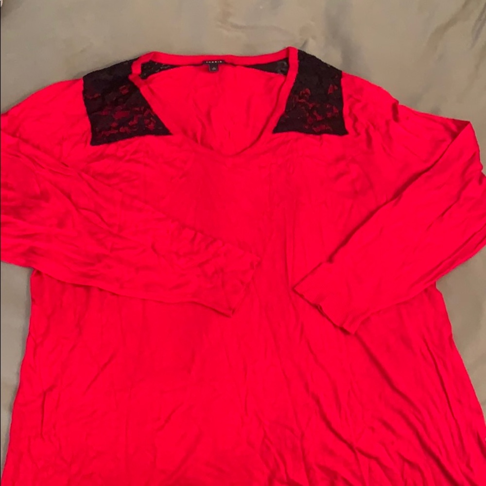 Red sweater with black lace neckline